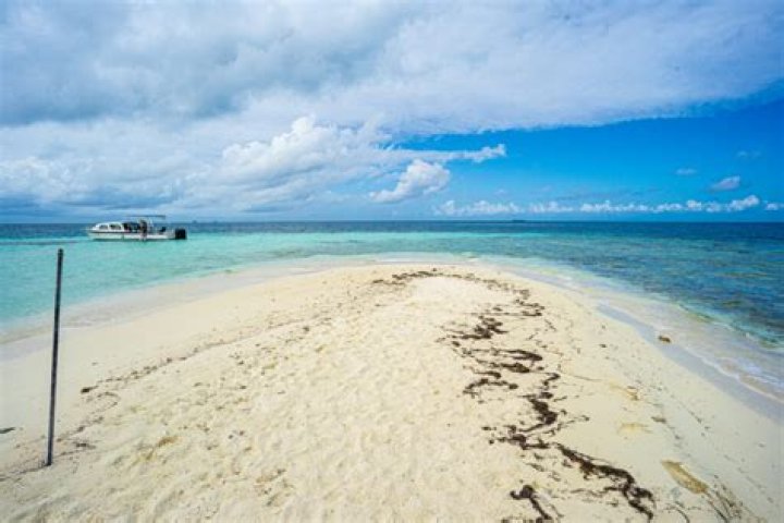 Does Belize have white sand beaches?