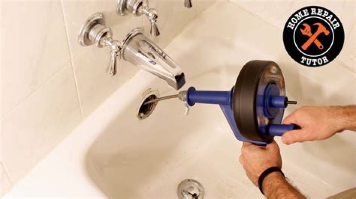 How do I keep my hair from clogging up the drain?