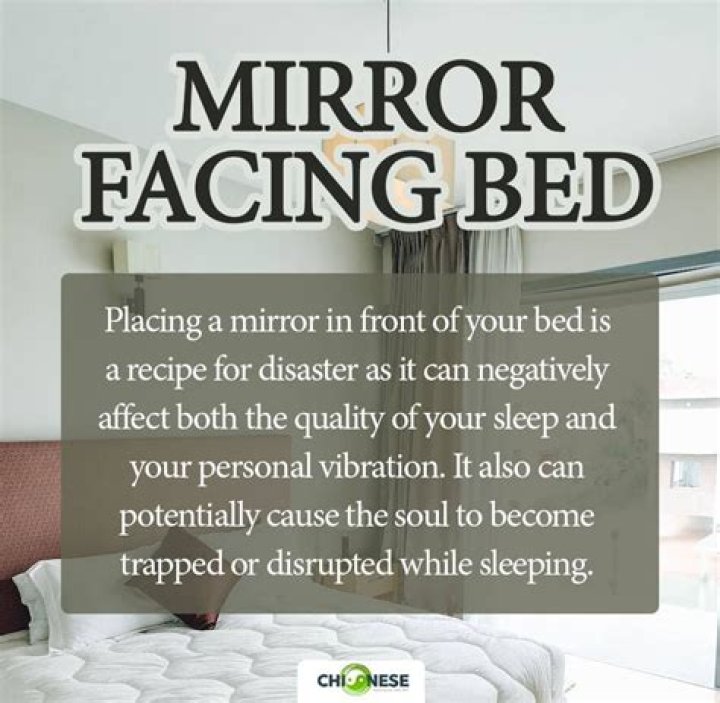 Is it OK to have a mirror facing your bed?